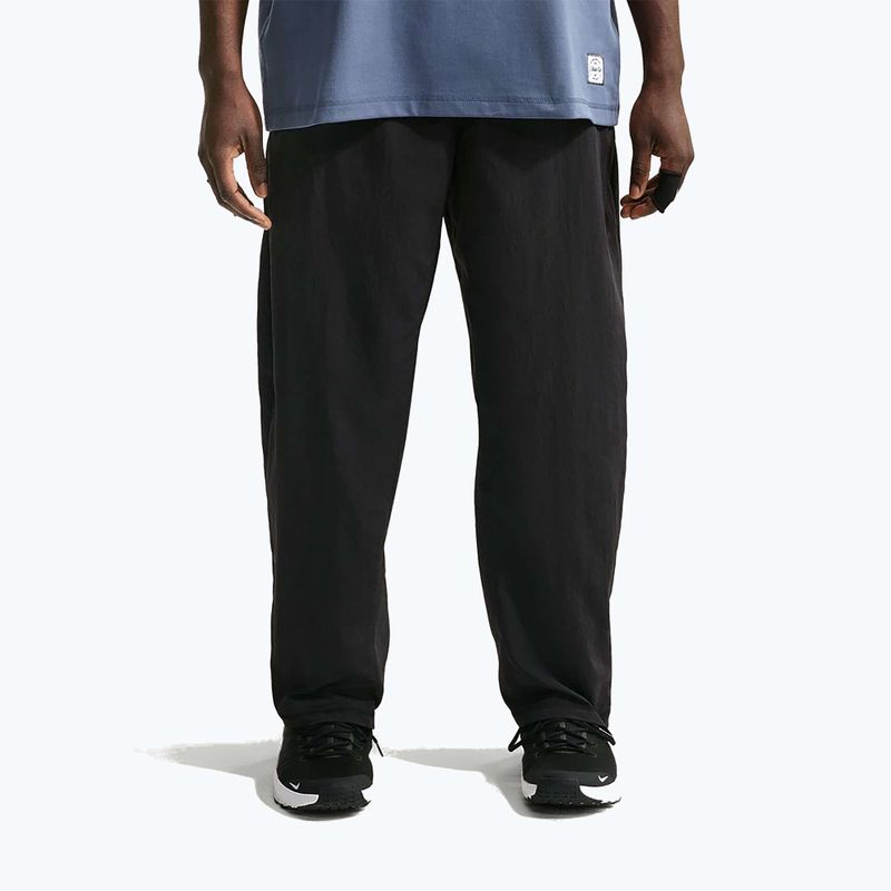 Pánské kalhoty Nike N.A.C. Dri-Fit Woven black/pale ivory/black