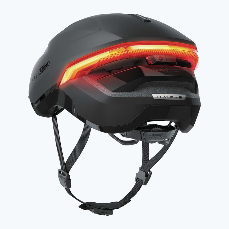 Cyklistická helma s blinkry ABUS Hyp-E volcano titan 4