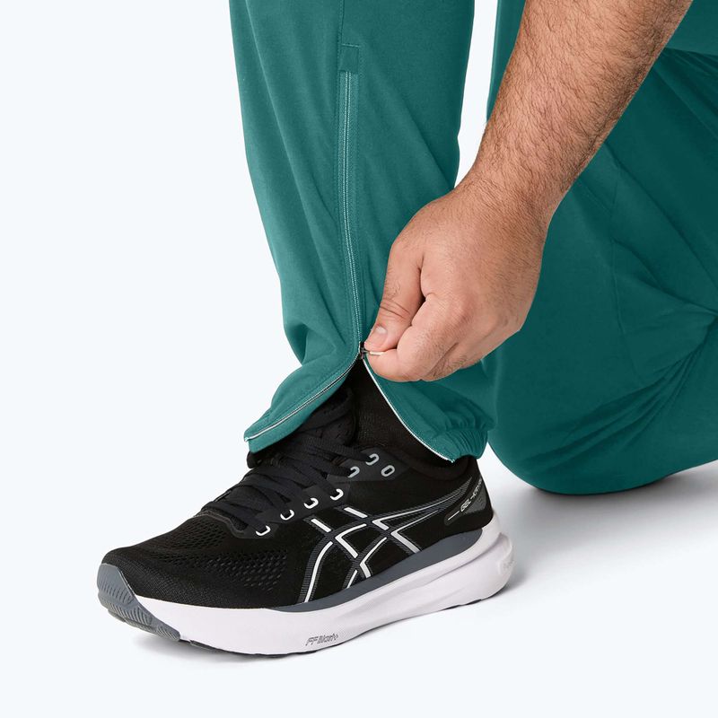 Pánské běžecké kalhoty ASICS Core Woven rainy lake 8